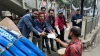 শিক্ষা ক্যাডার কর্মকর্তার আ.লীগের লিফলেট বিতরণ